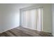 Bright bedroom with wood-look floors and sliding door at 7151 Stonington Ln, Charlotte, NC 28227