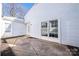 Small patio area adjacent to the back of the townhome at 7151 Stonington Ln, Charlotte, NC 28227