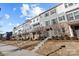 Row of townhouses showcasing architectural details and landscaping at 7840 Denmark Rd, Charlotte, NC 28273