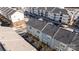 Aerial view of townhouses community, showcasing building rooftops at 7840 Denmark Rd, Charlotte, NC 28273