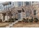 Townhouse exterior with stone accents and landscaping at 7840 Denmark Rd, Charlotte, NC 28273