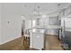 Modern kitchen with gray cabinets, granite counters, and island at 7840 Denmark Rd, Charlotte, NC 28273