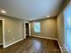 Spacious bedroom with wood-look flooring and a large closet at 808 Eastview St, Shelby, NC 28152