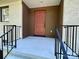 Inviting front entrance with a red door and modern railings at 808 Eastview St, Shelby, NC 28152