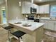 Modern kitchen featuring white shaker cabinets and quartz countertops at 808 Eastview St, Shelby, NC 28152