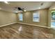 Spacious living room with wood-look flooring and neutral walls at 808 Eastview St, Shelby, NC 28152