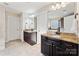 Bright bathroom features double sinks, granite countertops, and ample cabinet space at 829 Palmetto Bay Dr, Fort Mill, SC 29715