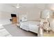 Bright main bedroom featuring high ceilings, a ceiling fan, and neutral tones at 829 Palmetto Bay Dr, Fort Mill, SC 29715