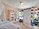 Charming bedroom with built in shelving and room divider at 846 Von Buren Blvd, Rock Hill, SC 29730