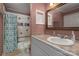 Bathroom with decorative tile, shower with curtain, and ample counter space at 9037 J M Keynes Dr # 23, Charlotte, NC 28262