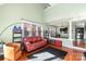 Spacious living area featuring hardwood floors, light green walls, and an open concept design at 9037 J M Keynes Dr # 23, Charlotte, NC 28262