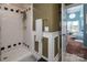 Shower with white subway tile and updated fixtures at 9037 J M Keynes Dr # 23, Charlotte, NC 28262