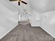 Large bonus room with grey carpet and ceiling fan at 918 Clover Park Dr, Clover, SC 29710