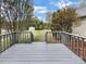 Back deck overlooking fenced backyard with storage shed at 918 Clover Park Dr, Clover, SC 29710