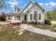 Charming one-story house with a covered porch and landscaped yard at 918 Clover Park Dr, Clover, SC 29710