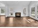 Bright living room featuring hardwood floors and fireplace at 918 Clover Park Dr, Clover, SC 29710