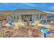 Brick patio with screened porch and outdoor furniture at 9428 Liberty Hill Dr, Mint Hill, NC 28227