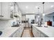 Kitchen featuring a large island with a sink, stainless steel appliances and lots of cabinet space at 9428 Liberty Hill Dr, Mint Hill, NC 28227