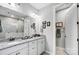 Bright main bathroom with granite counter tops, double vanity, and white cabinetry at 9428 Liberty Hill Dr, Mint Hill, NC 28227
