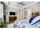 Bright main bedroom with hardwood floors, dresser and views of ensuite bathroom at 9428 Liberty Hill Dr, Mint Hill, NC 28227