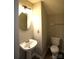 Small bathroom with pedestal sink and toilet at 9445 Meadowmont View Dr # 137, Charlotte, NC 28269