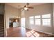 Bright dining area with hardwood floors and view to kitchen at 9445 Meadowmont View Dr # 137, Charlotte, NC 28269