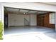 Attached garage with epoxy floor and shelving at 9445 Meadowmont View Dr # 137, Charlotte, NC 28269