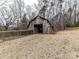 Rustic barn with large doors and wood siding at 955 Brafford Dr, Concord, NC 28025