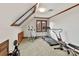 Upper level home gym with various exercise equipment at 955 Brafford Dr, Concord, NC 28025