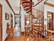 Elegant spiral staircase connecting floors at 955 Brafford Dr, Concord, NC 28025