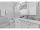 Bathroom with double vanity and marble countertop at 1009 Davant Ln, Charlotte, NC 28209