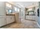Bright bathroom with a large frameless glass shower and double vanity at 102 Ellsworth Rd # 43, Mooresville, NC 28115