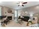 Elegant living room with fireplace, decorative panel wall, and modern furniture at 102 Ellsworth Rd # 43, Mooresville, NC 28115