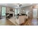 Elegant living room with fireplace, decorative panel wall, and modern furniture at 102 Ellsworth Rd # 43, Mooresville, NC 28115