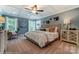 Serene main bedroom with large windows, trey ceiling, and stylish furnishings at 102 Ellsworth Rd # 43, Mooresville, NC 28115
