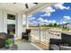 Relaxing covered porch with wicker furniture and neighborhood views at 102 Ellsworth Rd # 43, Mooresville, NC 28115