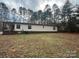 Single-story house exterior with large backyard at 104 Freeze Meadow Rd, China Grove, NC 28023