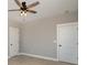 Cozy bedroom with wood-look floors and ceiling fan at 1085 Rolling Meadows Dr, Mooresville, NC 28115