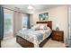 Bedroom with queen bed, dresser, and ensuite access at 1344 Middlecrest Nw Dr, Concord, NC 28027