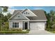 Two-story house with gray siding, white trim, and a two-car garage at 135 Goorawing Ln, Mooresville, NC 28115