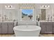 Elegant bathroom with a freestanding tub and dual vanities at 163 Holsworthy Dr, Mooresville, NC 28115