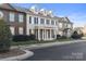 Two-story townhome with classic architecture and landscaping at 16908 Bridgewalk Dr, Charlotte, NC 28277