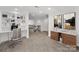 Upstairs home office features built-in shelves and a desk at 16908 Bridgewalk Dr, Charlotte, NC 28277