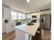 Modern kitchen with white cabinets, quartz countertops, and stainless steel appliances at 2862 Verdie Dr, Claremont, NC 28610