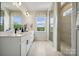 Spa-like bathroom with double vanity, large shower, and natural light at 3116 Beacon Heights Rd, Indian Land, SC 29707