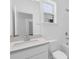 Clean, modern bathroom features a white vanity and fixtures, maximizing light and space at 3116 Beacon Heights Rd, Indian Land, SC 29707