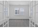 Bright bedroom with an open view, featuring carpet and natural light streaming through windows at 3116 Beacon Heights Rd, Indian Land, SC 29707