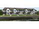 Modern townhouses with white and gray siding at 3116 Beacon Heights Rd, Indian Land, SC 29707