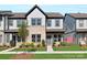 Charming new two-story townhome with landscaped front yard, brick accents, and inviting entrance at 3116 Beacon Heights Rd, Indian Land, SC 29707