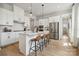 Modern white kitchen with stainless steel appliances at 3116 Beacon Heights Rd, Indian Land, SC 29707